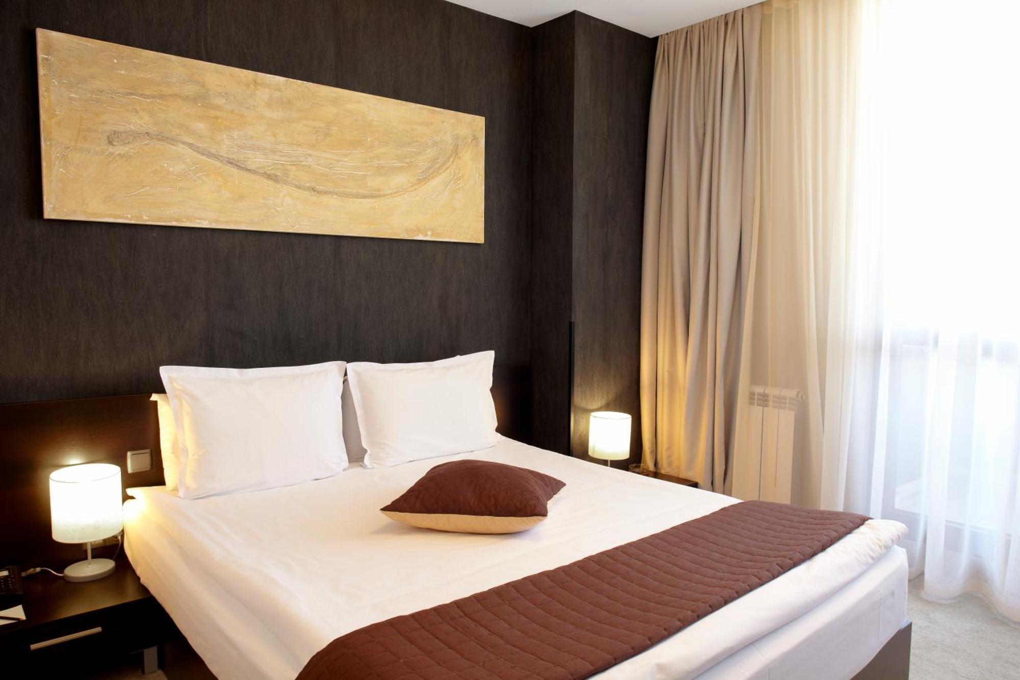 Lucky Bansko Aparthotel Spa & Relax Ngoại thất bức ảnh A bedroom